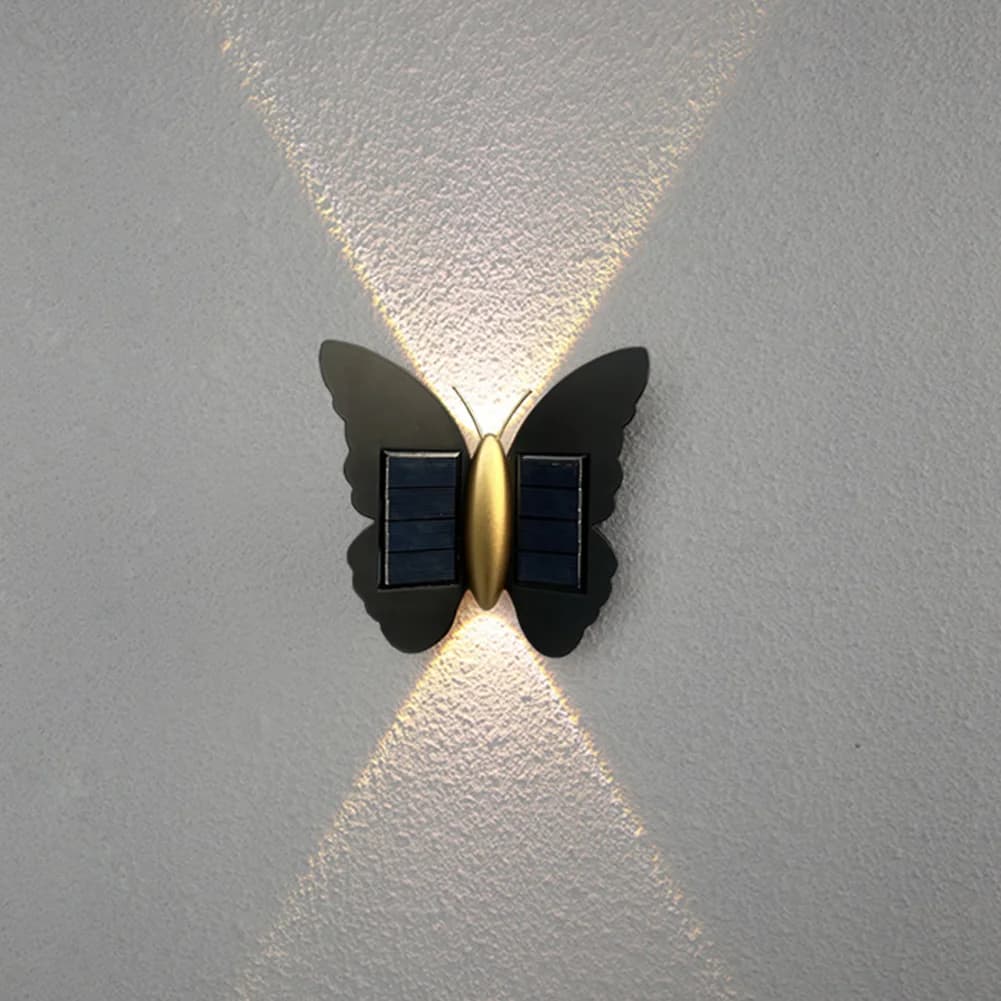Luz LED de pared para exteriores con forma de mariposa alimentada por energía solar